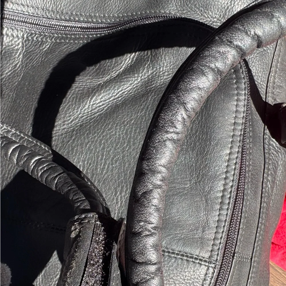 Piel Leather Multi-Compartment Duffel Bag.